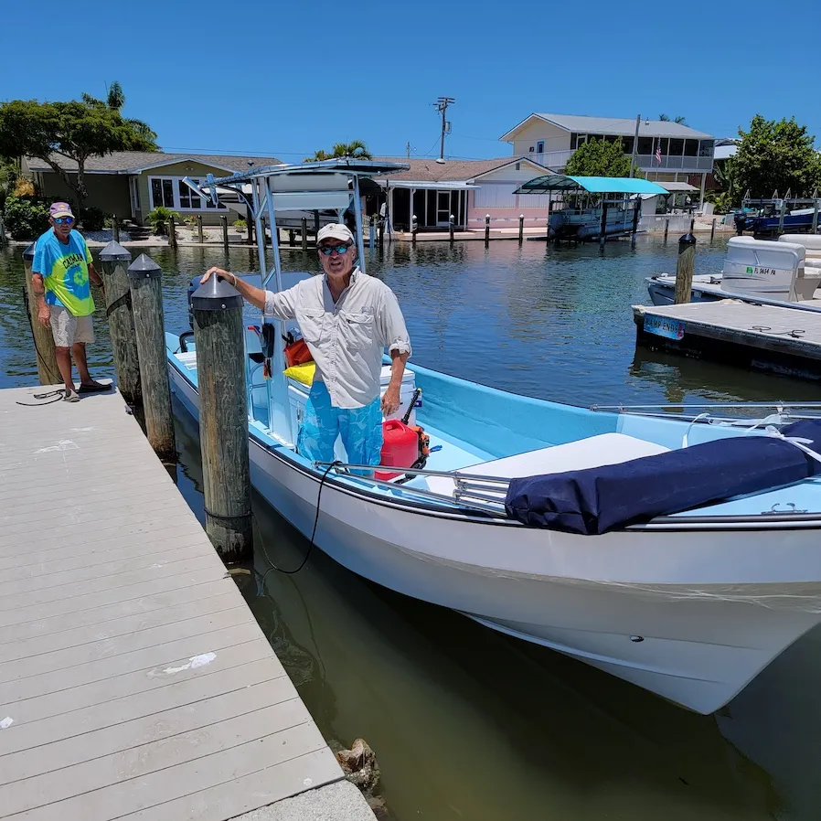 Panga owner at the dock with a custom IMEMSA panga