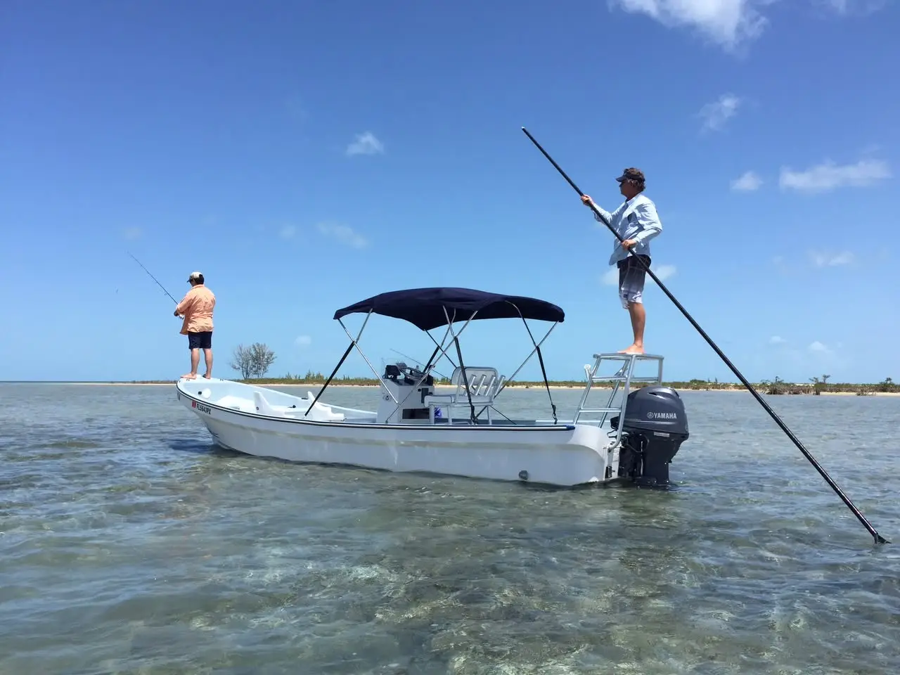 Panga Boats USA — W-26 on the Bahamas flats · Happy Owners